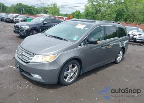 2011 Honda Odyssey Touring/Touring Elite z USA, uszkodzony, nr VIN 5FNRL5H94BB092085